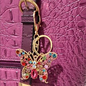NEW Butterfly-shaped bag charm or keychain adorned with multicolored rhinestones